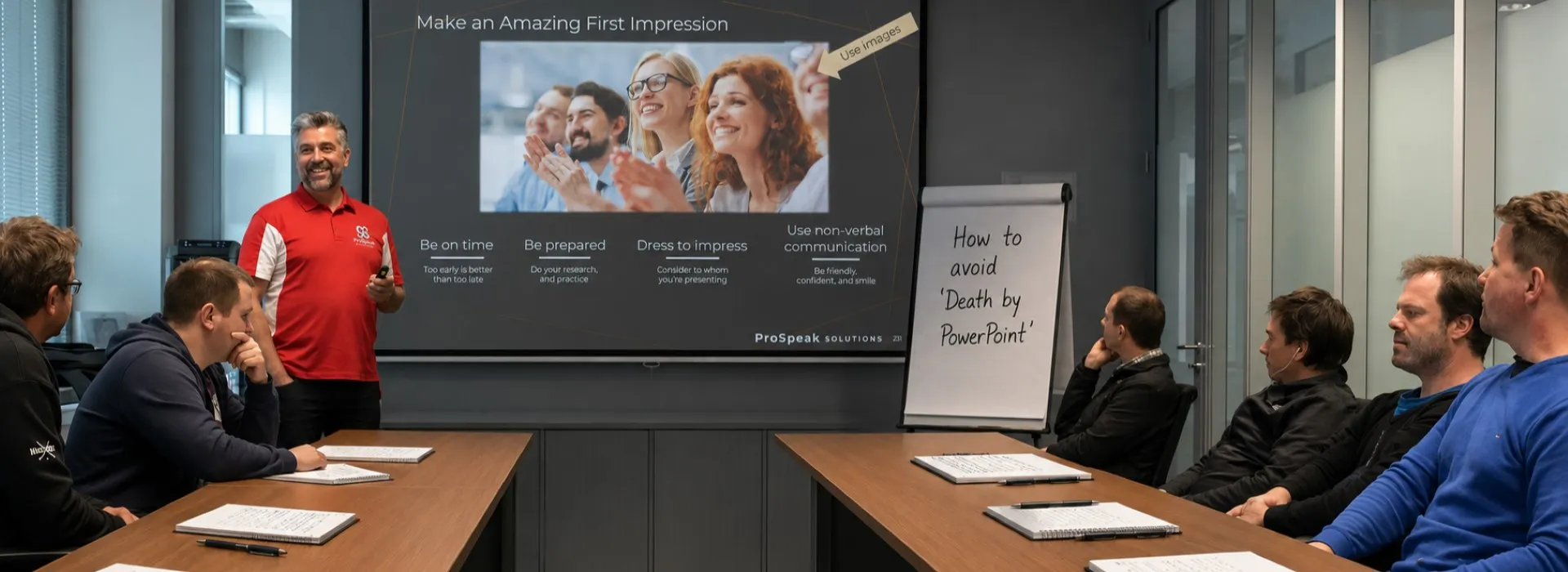 Trainer presenting a slide on making a strong first impression to a workshop group